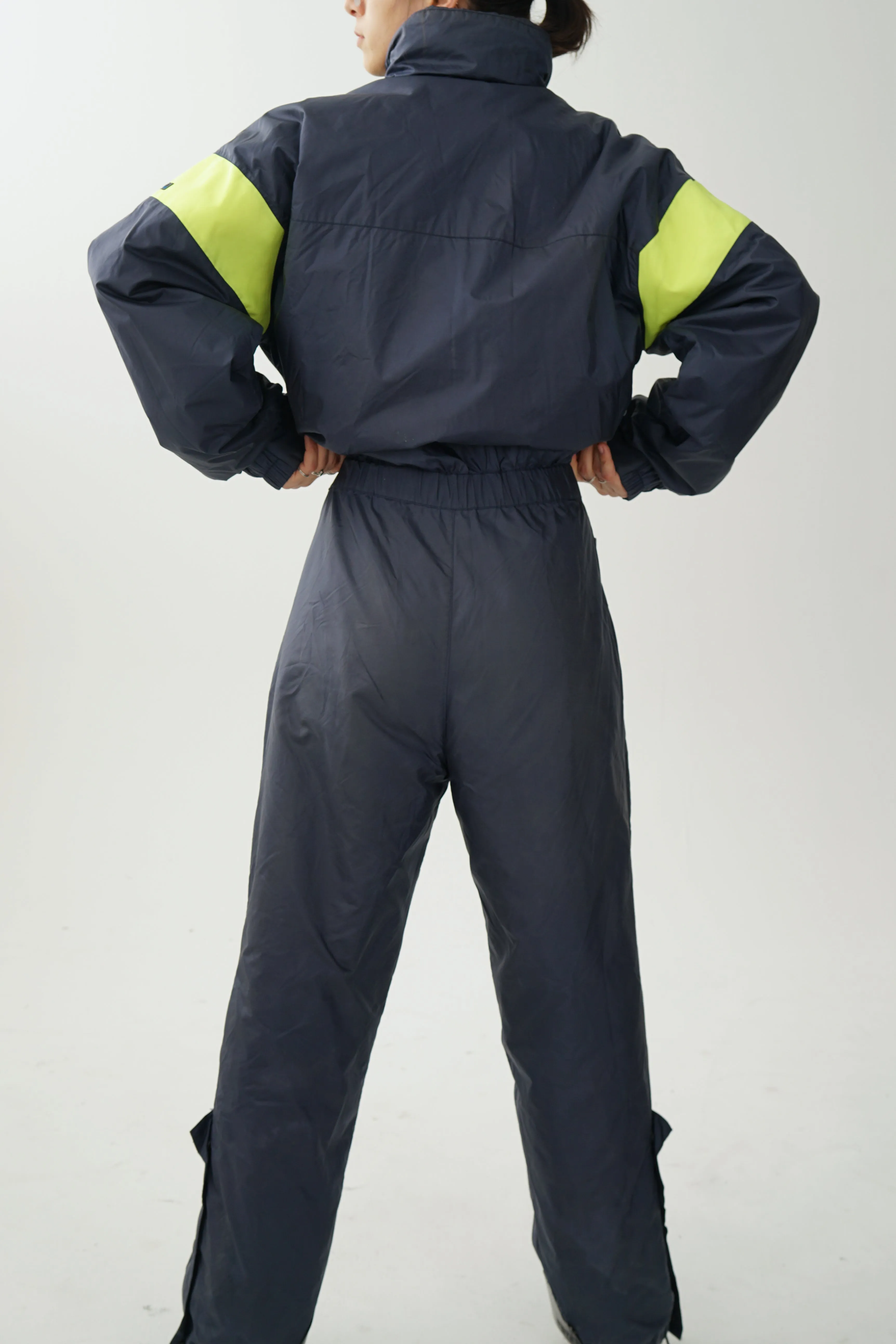 One piece vintage Nevica ski suit, snow suit bleu marin et jaune fluo pour homme taille 42 (M) tel quel